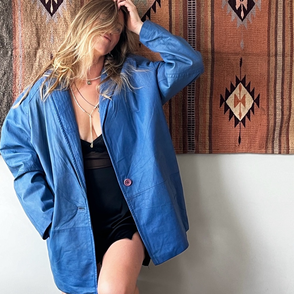 Bright blue vintage leather car coat
